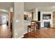 Kitchen view with stainless steel appliances opening up to the living area at 587 Jody Pl, Lilburn, GA 30047