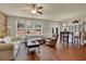 Open living room area with hardwood floors and access to outdoor space at 587 Jody Pl, Lilburn, GA 30047
