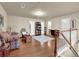 Spacious loft area showcasing hardwood floors, lots of natural light and extra space at 587 Jody Pl, Lilburn, GA 30047