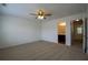 Spacious bedroom offers a ceiling fan and an en-suite bathroom, perfect for relaxing at 1837 Millstream Holw, Conyers, GA 30012
