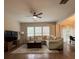 Spacious living room with hardwood floors, large windows, and comfortable furnishings at 2692 Briaroak Dr, Duluth, GA 30096