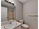 Bathroom with white vanity, tile floors, a toilet and a tub with shower at 3081 Frankie Ln, Duluth, GA 30096
