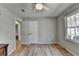 Bedroom with hardwood floors, closet, and natural light at 3081 Frankie Ln, Duluth, GA 30096