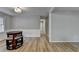 Dining room with hardwood floors, wainscoting, and natural light at 3081 Frankie Ln, Duluth, GA 30096