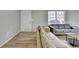 Bright living room with wood-look floors and neutral decor at 3081 Frankie Ln, Duluth, GA 30096