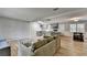 Open concept living space featuring wood flooring, gray walls and kitchen view at 3081 Frankie Ln, Duluth, GA 30096