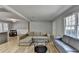 Comfortable living room with sectional sofa and view to front door at 3081 Frankie Ln, Duluth, GA 30096