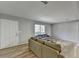 Open living room features wood-look floors and a neutral color palette at 3081 Frankie Ln, Duluth, GA 30096