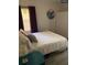 Bedroom with white walls, closet, and neutral decor at 609 Spring St, Atlanta, GA 30354