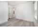 Wood-look flooring is featured in this freshly painted bedroom, adjacent to ensuite at 609 Spring St, Atlanta, GA 30354
