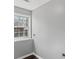 Bright laundry room with window, neutral walls and flooring at 6332 Fairoaks Pl, Douglasville, GA 30135