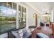 Inviting front porch with seating, a ceiling fan, and views of the neighborhood at 1257 Arkwright Se Pl, Atlanta, GA 30317