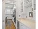 Butler's pantry featuring wine storage and countertops, leading to the kitchen at 1257 Arkwright Se Pl, Atlanta, GA 30317