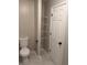 Bathroom with toilet and storage shelves at 425 Orchard Dr, Stone Mountain, GA 30083