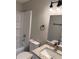 Bathroom featuring modern fixtures, granite vanity, and a bright white tub at 425 Orchard Dr, Stone Mountain, GA 30083