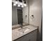 Bathroom vanity featuring granite countertops and modern fixtures at 425 Orchard Dr, Stone Mountain, GA 30083