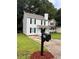 Charming home with a well-maintained front yard and classic mailbox at 425 Orchard Dr, Stone Mountain, GA 30083