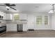 Modern kitchen featuring granite countertops, stainless steel appliances, and plenty of cabinet space at 425 Orchard Dr, Stone Mountain, GA 30083