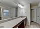 Elegant bathroom featuring granite countertop and modern fixtures at 13030 Dartmore Ave, Alpharetta, GA 30005