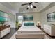 Beautifully staged bedroom with modern decor and stylish furnishings at 13030 Dartmore Ave, Alpharetta, GA 30005