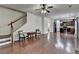 Spacious open-plan living area with beautiful hardwood flooring and plenty of natural light at 13030 Dartmore Ave, Alpharetta, GA 30005