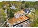 Aerial view of a two-story home under construction on a spacious lot in a suburban neighborhood at 1445 West Wesley Ne Rd, Atlanta, GA 30327
