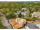 Aerial view of new home construction site showcasing progress in an established residential area at 1445 West Wesley Ne Rd, Atlanta, GA 30327