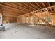 A partially built living room showcasing the framing structure and staircase at 1445 West Wesley Ne Rd, Atlanta, GA 30327