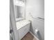 Modern half bathroom features granite vanity and updated fixtures at 4811 Westgate Blvd, Atlanta, GA 30349