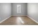 Empty bedroom with hardwood floors and natural light at 4811 Westgate Blvd, Atlanta, GA 30349