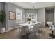 Bright dining room with a modern table and stylish chairs next to the kitchen at 4811 Westgate Blvd, Atlanta, GA 30349