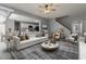 Stylishly furnished living room with an open layout and a view of the modern kitchen at 4811 Westgate Blvd, Atlanta, GA 30349