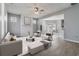 Bright, open living room featuring modern decor, neutral tones, and seamless access to dining area at 4811 Westgate Blvd, Atlanta, GA 30349