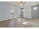 Spacious living room with hardwood floors, shiplap fireplace, and plenty of natural light at 4811 Westgate Blvd, Atlanta, GA 30349