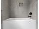 Close-up of a bathtub with gray tiled walls and matte black fixtures at 510 Price Rd, Carrollton, GA 30116