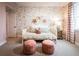 Cozy bedroom with decorative wallpaper, a daybed, and soft furnishings at 5109 Hillside Haven Dr, Powder Springs, GA 30127