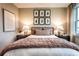 Bedroom featuring feather wall art, soft bedding, and dark wood nightstands at 5109 Hillside Haven Dr, Powder Springs, GA 30127