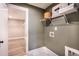 Laundry room with built-in shelving and laundry connections at 5109 Hillside Haven Dr, Powder Springs, GA 30127