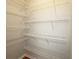 Walk-in closet with multiple shelves for organized storage solutions at 5415 Keithwood Dr, Cumming, GA 30040