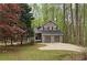 Charming home featuring a two-car garage, and well-maintained landscaping at 5415 Keithwood Dr, Cumming, GA 30040