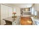 Kitchen with a stainless steel island and access to the living area at 5415 Keithwood Dr, Cumming, GA 30040