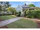 Well-manicured lawn and stone pathway lead to this charming home with a inviting front porch, perfect for relaxation at 176 Stewart Nw Ave, Marietta, GA 30064