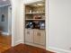 Charming built-in nook featuring open shelving, custom cabinets, and recessed lighting at 1886 Chedworth Ct, Stone Mountain, GA 30087
