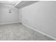 Unfinished basement with tile flooring and white painted walls at 2865 Maple Vista Ln, Lawrenceville, GA 30044