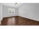 Bedroom with a vaulted ceiling, ceiling fan, and a bright window at 2865 Maple Vista Ln, Lawrenceville, GA 30044