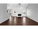 Inviting living room showcasing hardwood floors, a fireplace, and windows offering lots of natural light at 2865 Maple Vista Ln, Lawrenceville, GA 30044