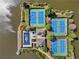 Aerial view of a lake community featuring tennis courts, a pool, and lush greenery at 6960 Dockbridge Way, Stone Mountain, GA 30087
