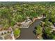 Aerial view of community clubhouse on a lake at 6960 Dockbridge Way, Stone Mountain, GA 30087