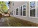 A spacious back deck with views of the home's backyard, blending indoor-outdoor living at 6960 Dockbridge Way, Stone Mountain, GA 30087
