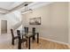 Dining room displays modern lighting and stylish decor at 6960 Dockbridge Way, Stone Mountain, GA 30087